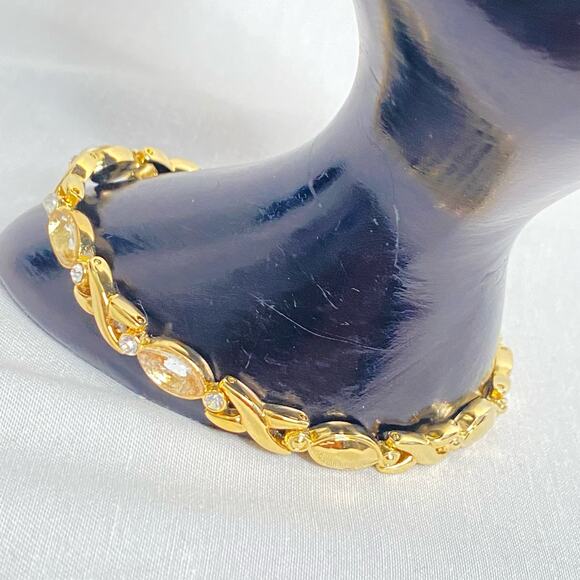 XO Bracelet Gold Tone Chain Links With Clear Round And Oval Stones Folding Clasp - Picture 3 of 10